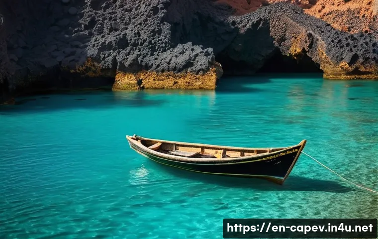 카보베르데 낚시 투어 - A serene early morning scene at a secluded volcanic bay in Cabo Verde, featuring a small wooden “bat...