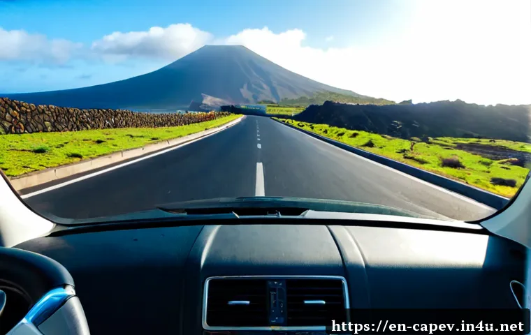 카보베르데 렌터카 주행법 - Photorealistic view from inside a modern rental car driving on the right side of a smooth coastal ro...